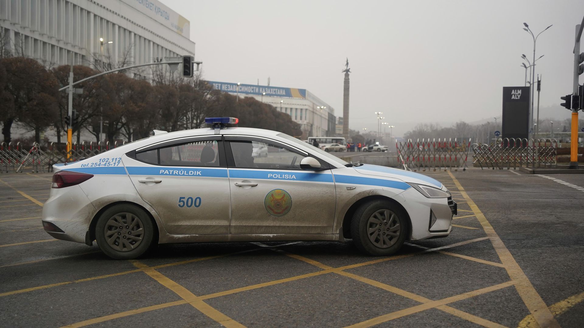 Автомобиль полиции в центре Алма-Аты Автомобиль полиции в центре Алма-Аты - РИА Новости, 1920, 20.01.2022