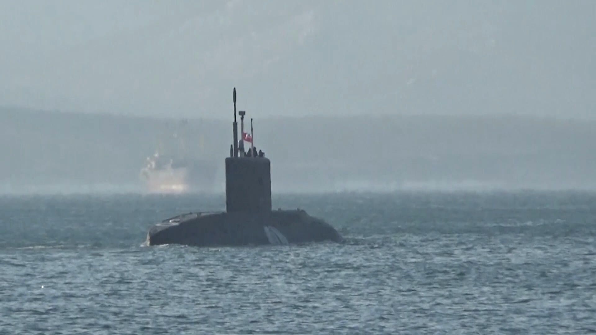Подводная лодка Волхов во время учений в акватории Японского моря. Кадр видео Подводная лодка Волхов во время учений в акватории Японского моря. Кадр видео - РИА Новости, 1920, 20.01.2022