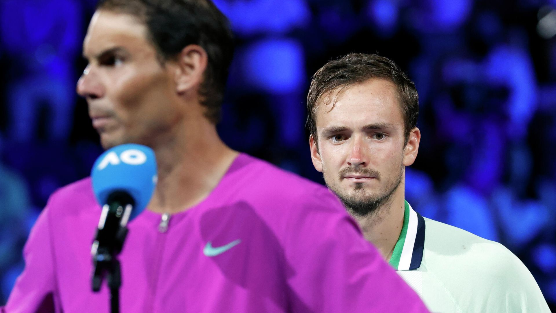 Tennis - Australian Open - Men's Singles Final - Melbourne Park, Melbourne, Australia - January 31, 2022 Spain's Rafael Nadal gives a speech to celebrates winning the men's singles final as Russia's Daniil Medvedev looks on REUTERS/Asanka Brendon Ratnayake - РИА Новости, 1920, 30.01.2022