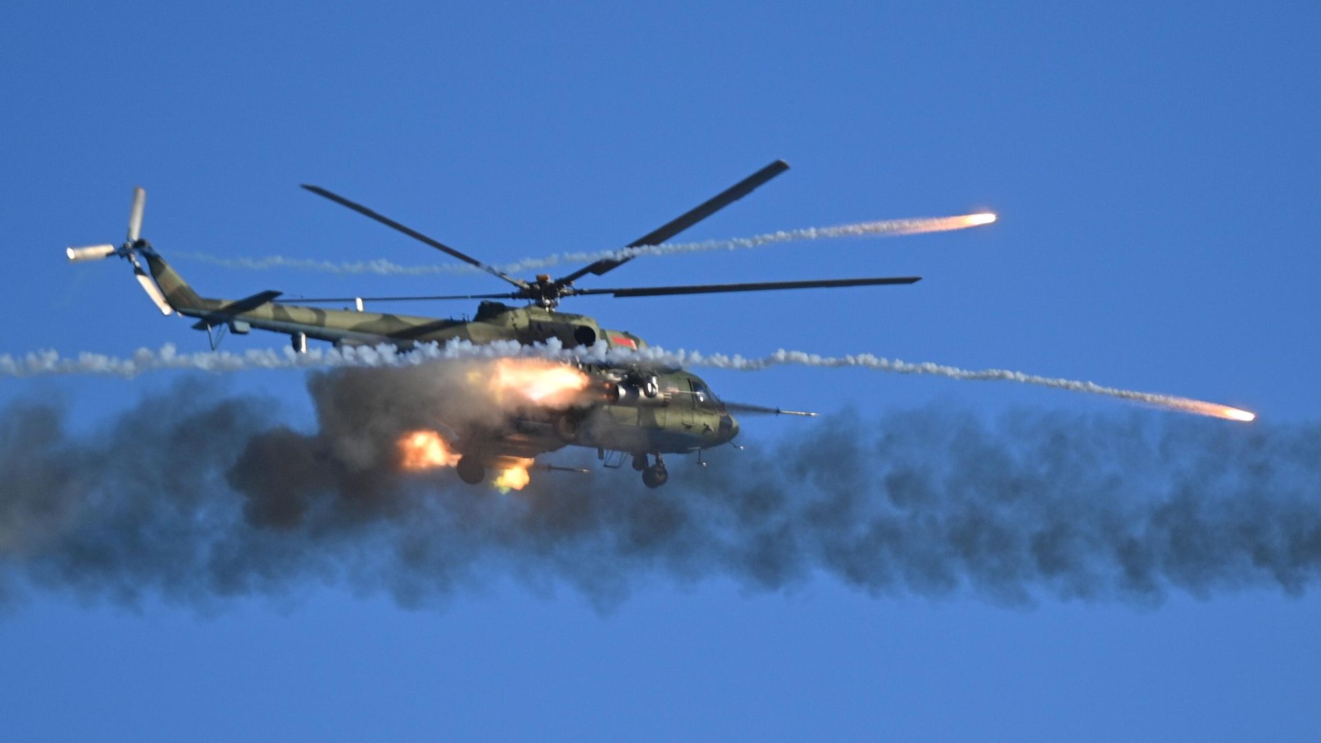 Многоцелевой вертолет Ми-9 ВС Белоруссии производит стрельбу во время совместных учений России и Белоруссии - РИА Новости, 1920, 20.01.2023