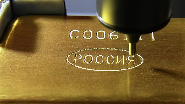 Маркировка слитка золота высшей пробы 99,99 процентов чистоты