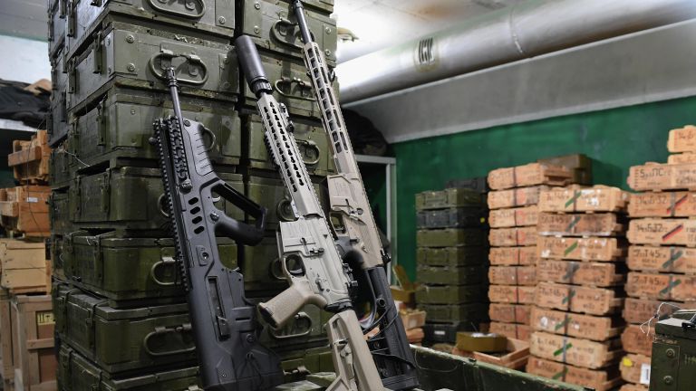 Склад с оружием и боеприпасами национальной гвардии Украины, обнаруженный на территории Запорожской атомной электростанции, расположенной на берегу Каховского водохранилища в городе Энергодар Склад с оружием и боеприпасами национальной гвардии Украины, обнаруженный на территории Запорожской атомной электростанции, расположенной на берегу Каховского водохранилища в городе Энергодар