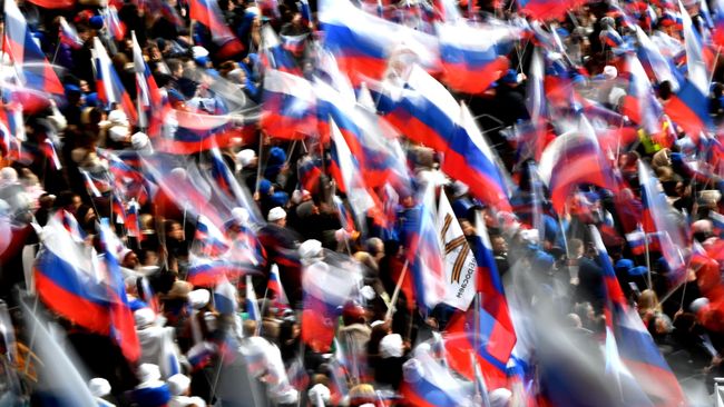 Участники митинга-концерта в Лужниках, посвященного воссоединению Крыма с Россией