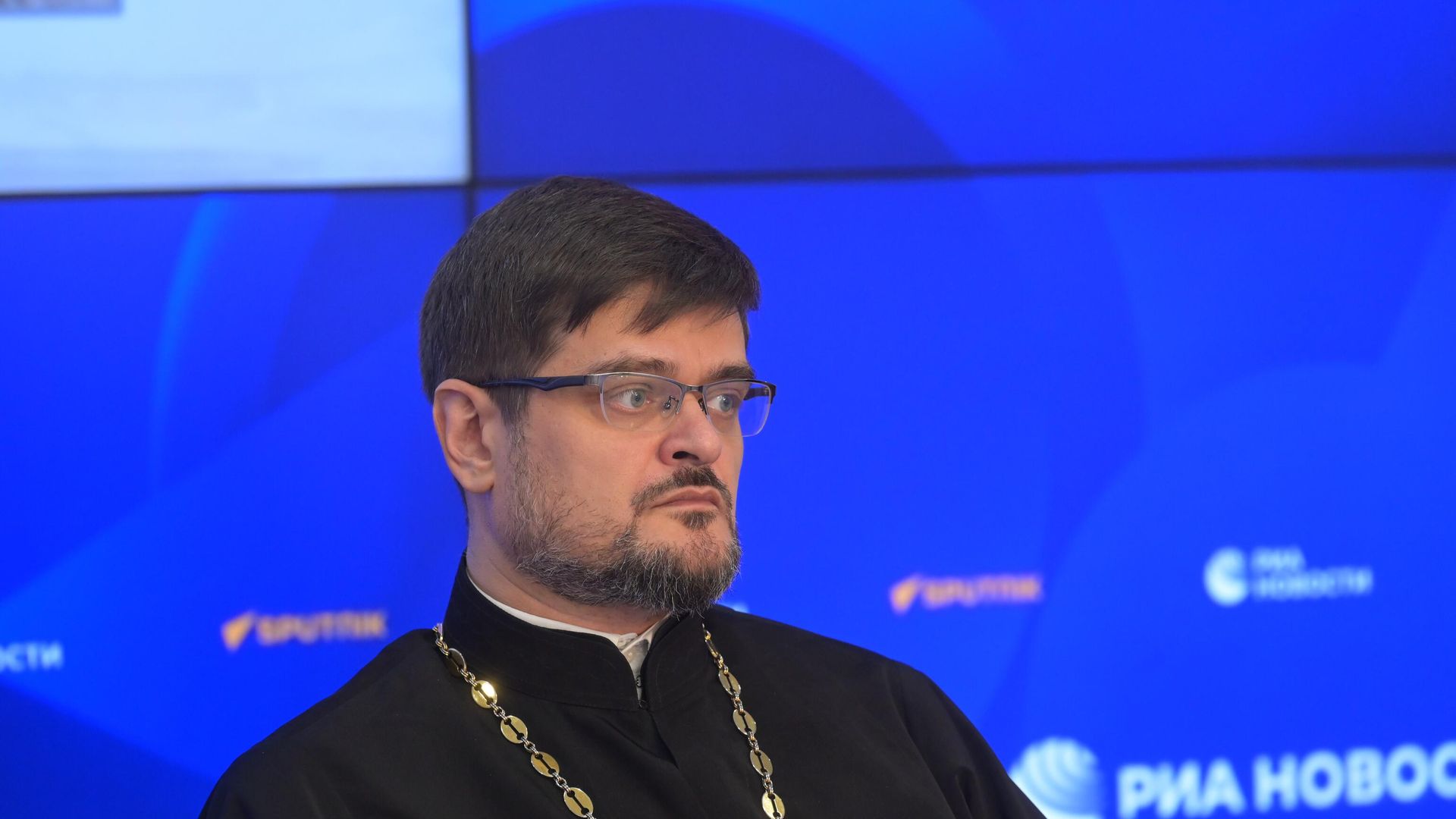 Секретарь Отдела внешних церковных связей Московского Патриархата, руководитель Межрелигиозной рабочей группы по защите прав верующих от дискриминации и ксенофобии иеромонах Стефан (Игумнов) во время пресс-конференции Традиционные религиозные конфессии России: помогая Донбассу в Международном мультимедийном пресс-центре МИА Россия сегодня в Москве. - РИА Новости, 1920, 14.04.2022