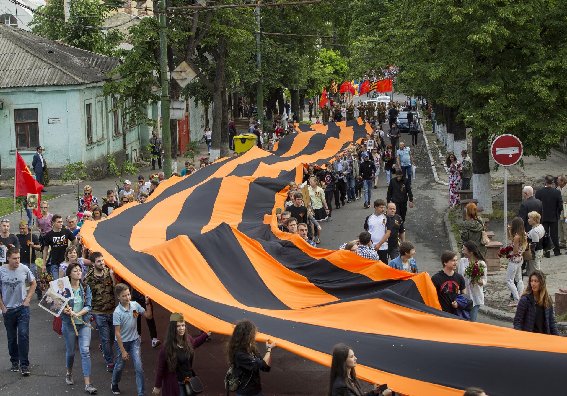 Участники акции Бессмертный полк в Кишиневе. 2018 год Участники акции Бессмертный полк в Кишиневе. 2018 год - РИА Новости, 1920, 28.04.2022