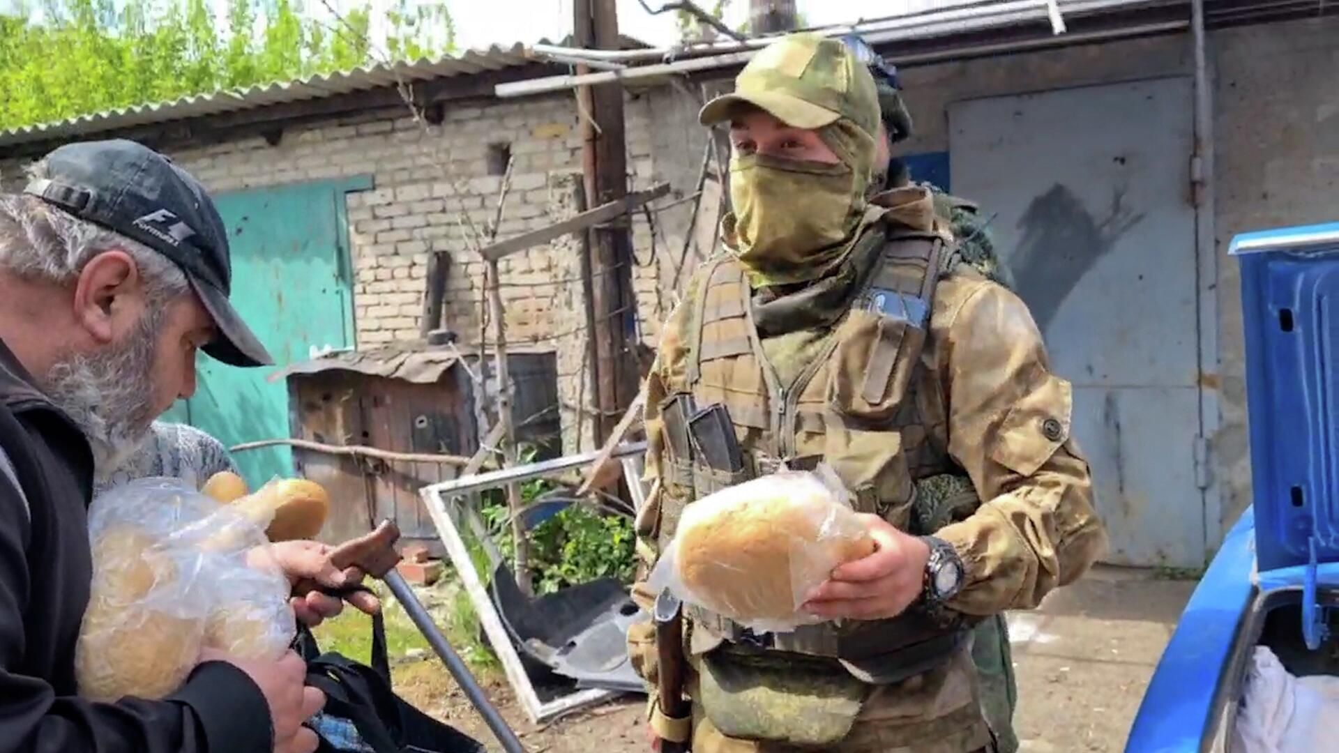 Работа военной комендатуры ЛНР в городе Попасная Работа военной комендатуры ЛНР в городе Попасная - РИА Новости, 1920, 14.05.2022