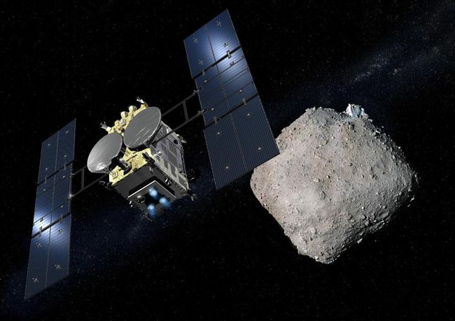 Космический аппарат Хаябуса-2 приближается к астероиду Рюгу (представление художника)