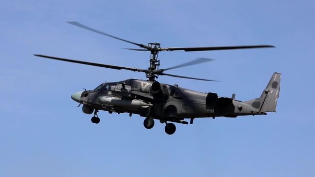 Ударный вертолет Ка-52 ВКС России, задействованный в специальной военной операции. Скриншот видео Ударный вертолет Ка-52 ВКС России, задействованный в специальной военной операции. Скриншот видео