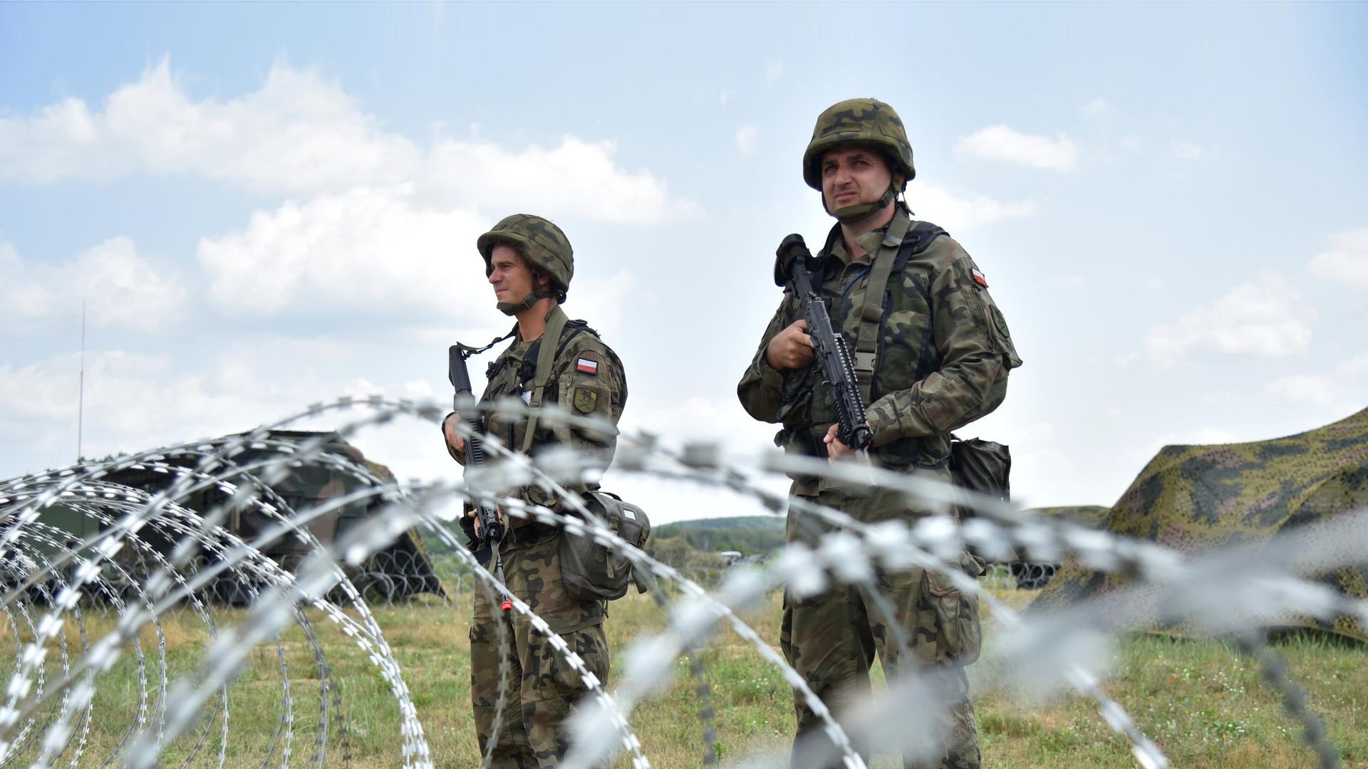 Польские военнослужащие на тактических учениях Три меча-2021 с участием вооружённых сил Украины и стран НАТО на Яворовском полигоне во Львовской области Польские военнослужащие на тактических учениях Три меча-2021 с участием вооружённых сил Украины и стран НАТО на Яворовском полигоне во Львовской области - РИА Новости, 1920, 23.08.2021