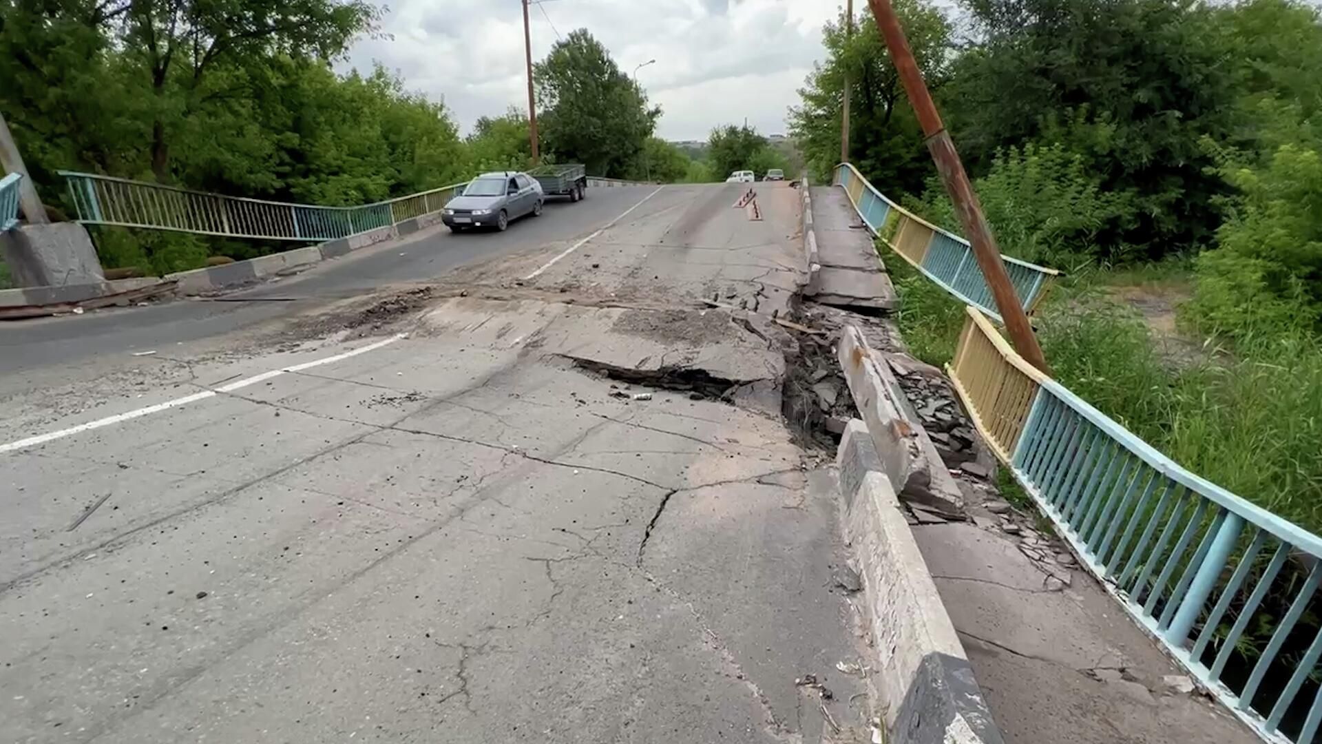 Кадры подготовки к восстановлению моста в Мариуполе Кадры подготовки к восстановлению моста в Мариуполе - РИА Новости, 1920, 10.07.2022