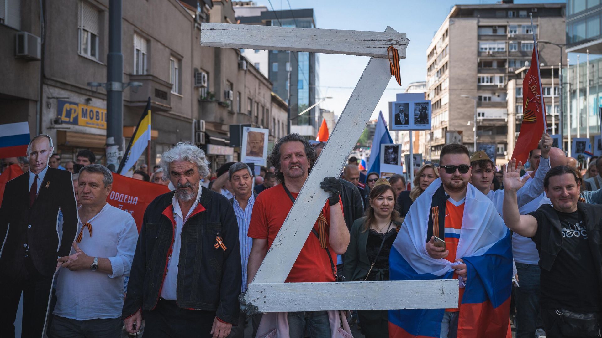Участники акции Бессмертный полк в Белграде. 9 мая 2022 Участники акции Бессмертный полк в Белграде. 9 мая 2022 - РИА Новости, 1920, 20.07.2022