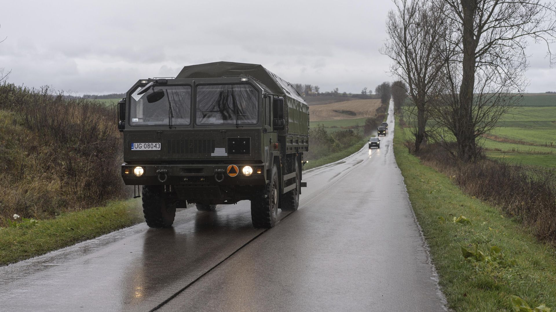 Военный автомобиль на дороге в районе населенного пункта Пшеводув Военный автомобиль на дороге в районе населенного пункта Пшеводув - РИА Новости, 1920, 18.11.2022