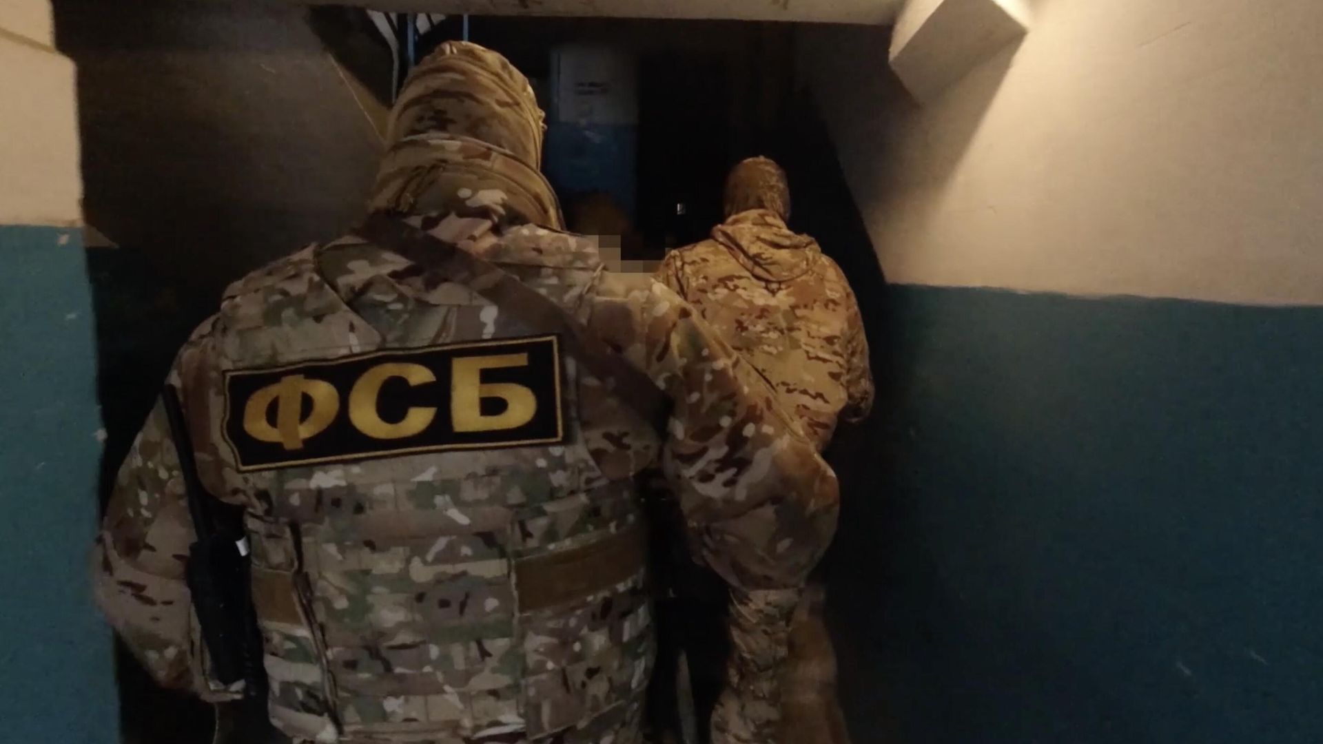 Задержание жителей Севастополя, подозреваемых в передаче украинским спецслужбам данных о военных объектах. Кадр видео - РИА Новости, 1920, 13.12.2022