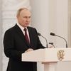 Президент РФ Владимир Путин выступает на торжественном приеме в Кремле накануне Дня Героев Отечества