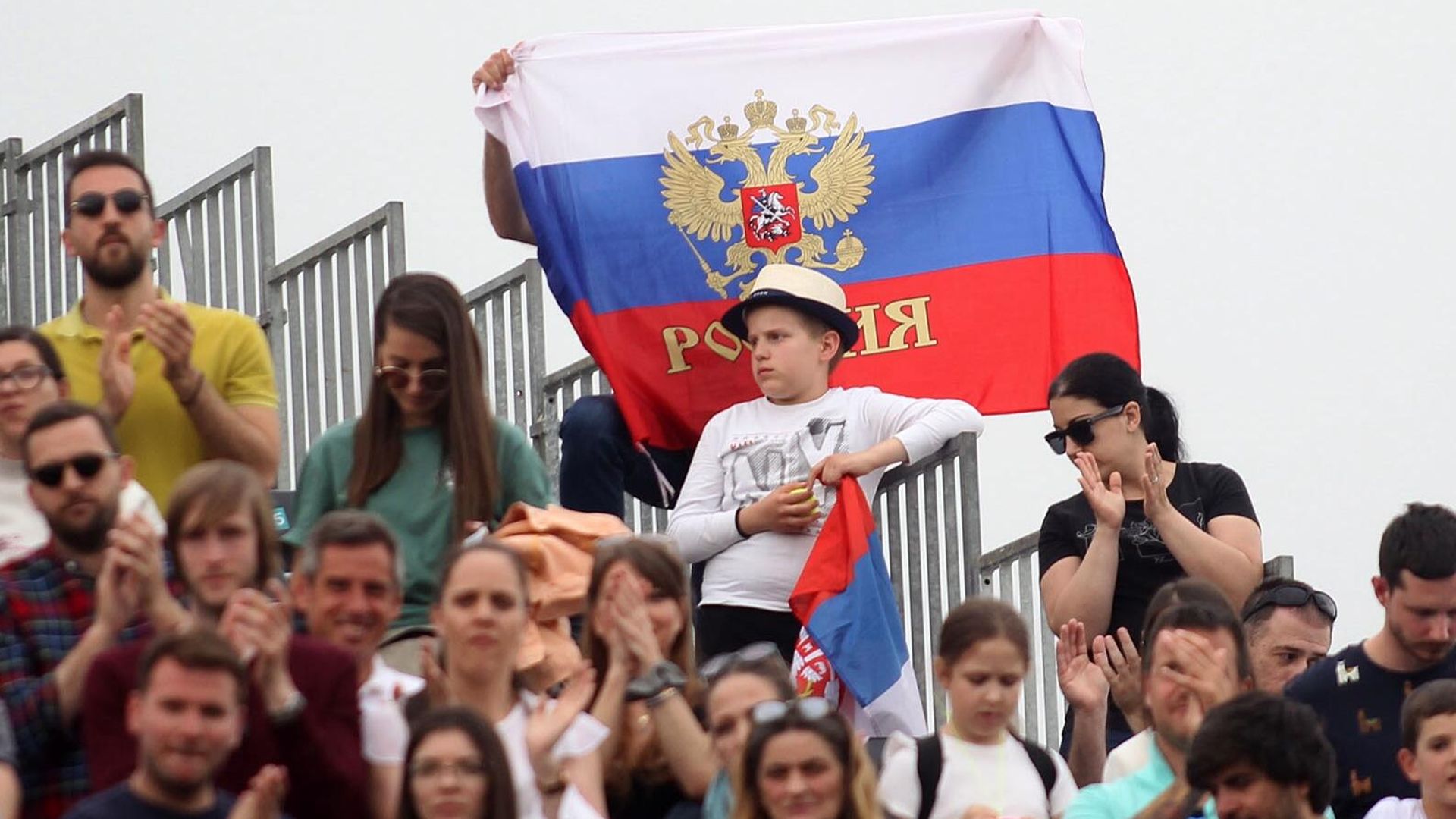 Российские и сербские болельщики на матче Новака Джоковича и Андрея Рублева Российские и сербские болельщики на матче Новака Джоковича и Андрея Рублева - РИА Новости, 1920, 25.01.2023