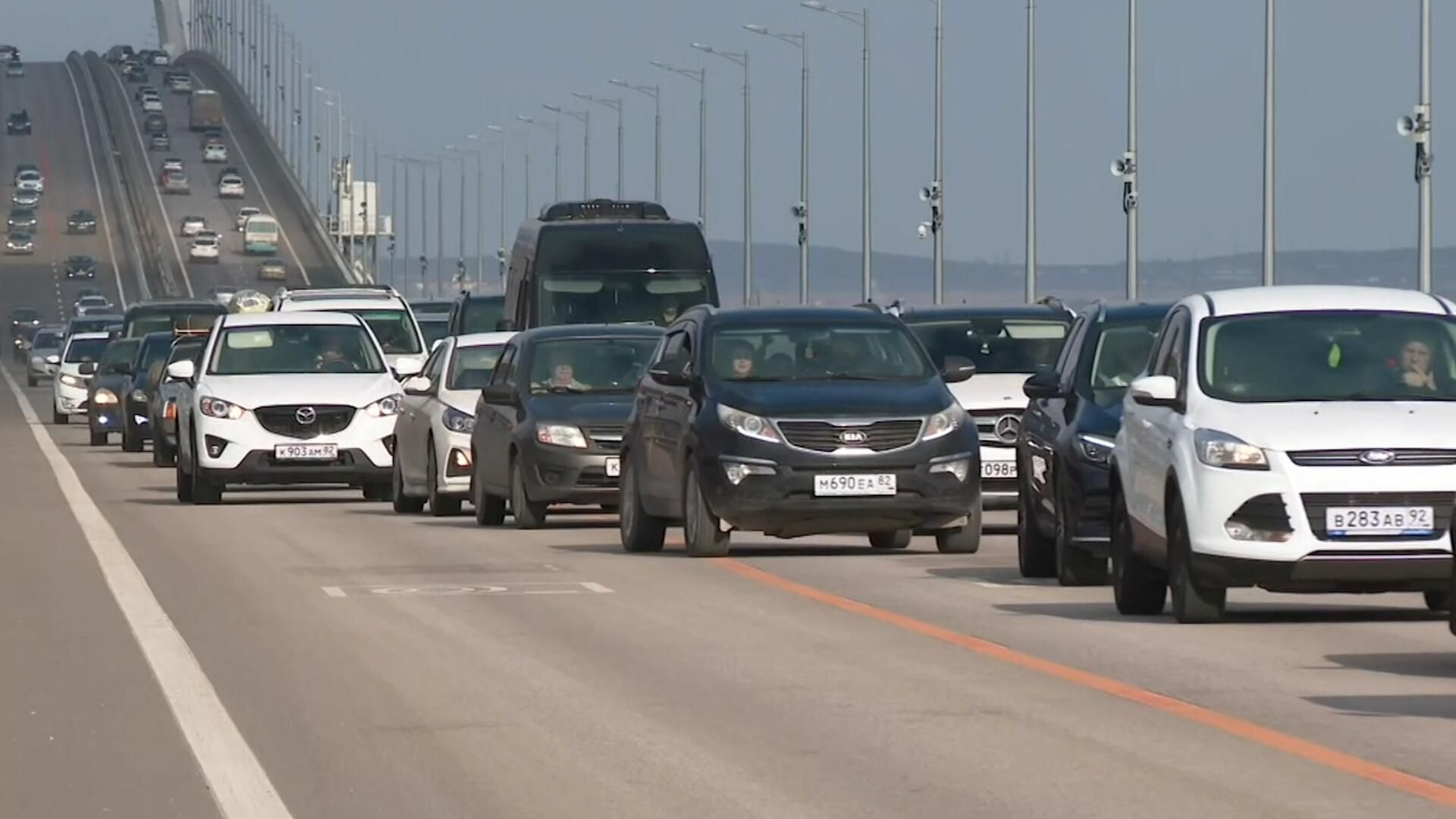 Автомобильное движение по Крымскому мосту Автомобильное движение по Крымскому мосту - РИА Новости, 1920, 23.02.2023