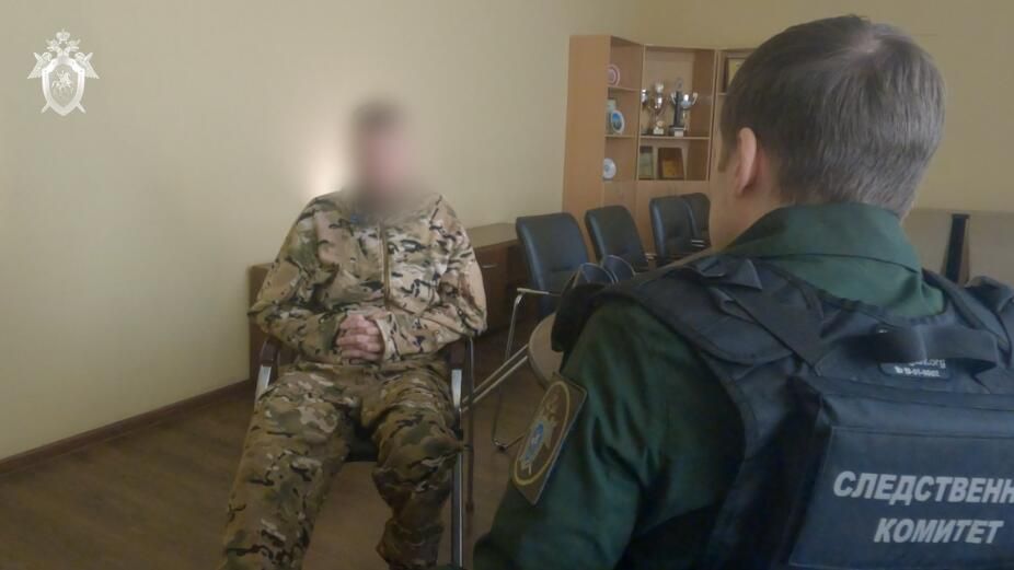 Сотрудник СК беседует с российским военнослужащим, вернувшимся из украинского плена Сотрудник СК беседует с российским военнослужащим, вернувшимся из украинского плена - РИА Новости, 1920, 19.05.2023
