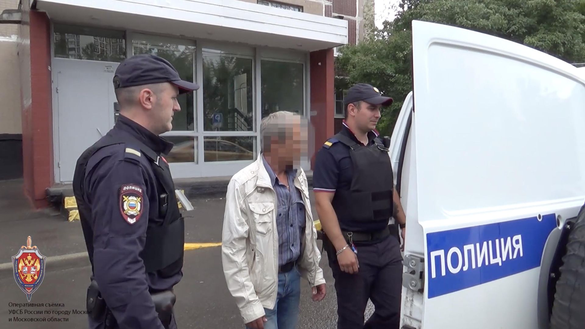 Задержание руководящего сотрудника одного из оборонных предприятий в Москве. Кадр видео Задержание руководящего сотрудника одного из оборонных предприятий в Москве. Кадр видео - РИА Новости, 1920, 13.09.2023