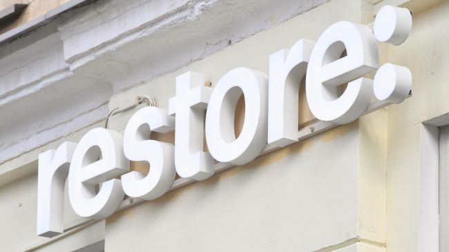 Табличка нового магазина сети restore: 