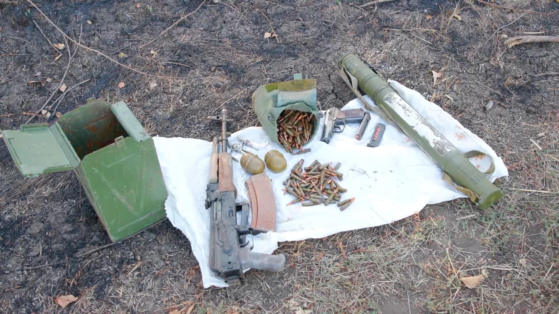 Cхрон с оружием в окрестностях Мариуполя Cхрон с оружием в окрестностях Мариуполя - РИА Новости, 1920, 16.09.2023