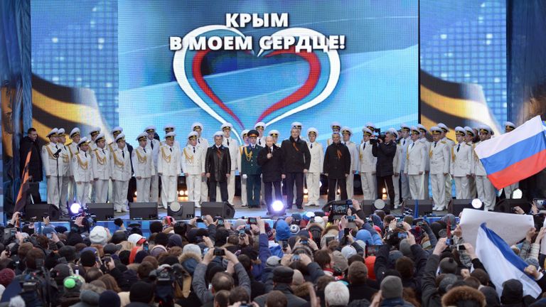 Президент России Владимир Путин во время выступления на митинг-концерте Мы вместе! на Красной площади в Москве.