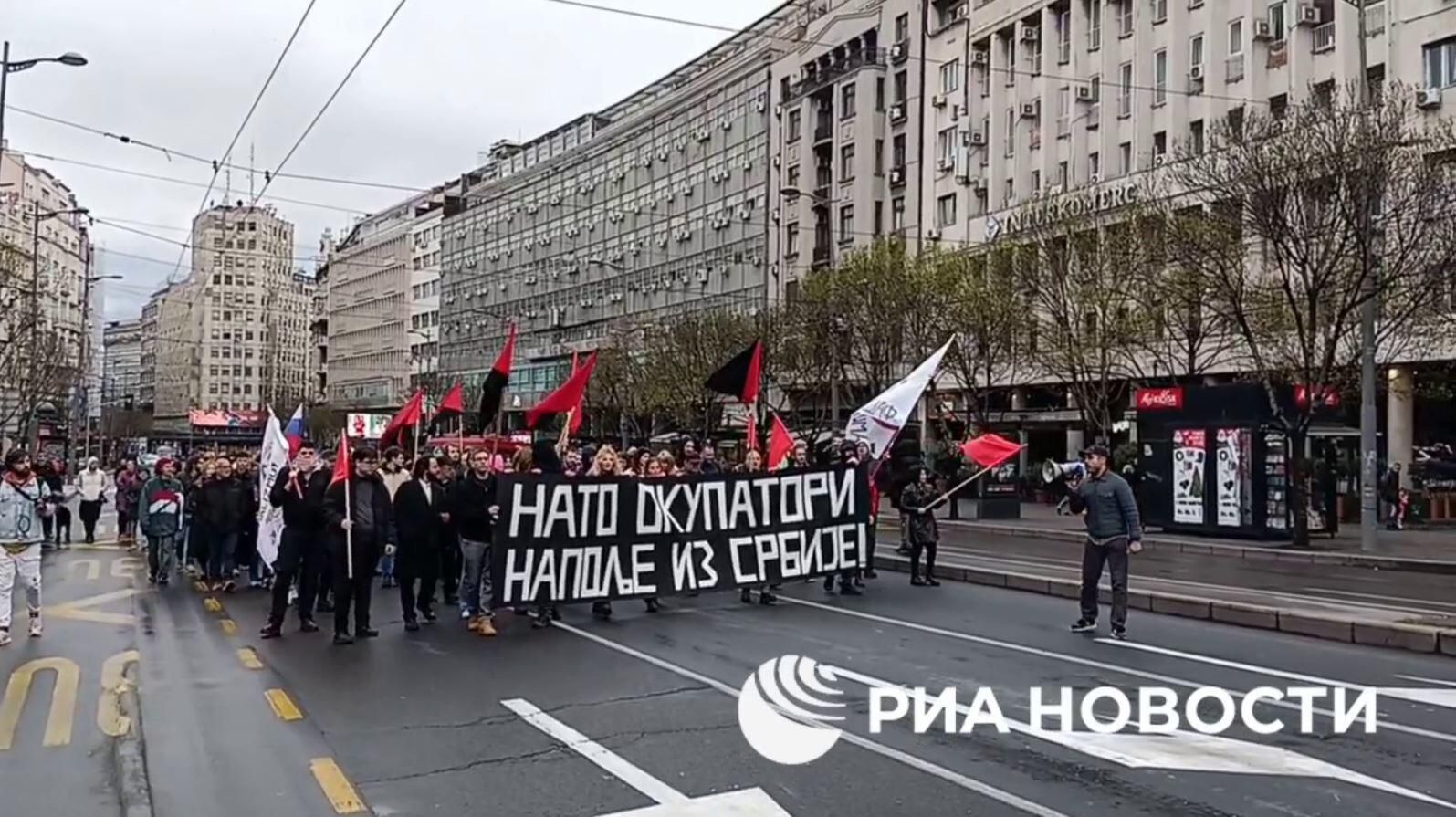 Участники митинга в 25-ю годовщину бомбардировок НАТО Союзной Республики Югославии в Белграде. Кадр видео Участники митинга в 25-ю годовщину бомбардировок НАТО Союзной Республики Югославии в Белграде. Кадр видео - РИА Новости, 1920, 15.04.2024