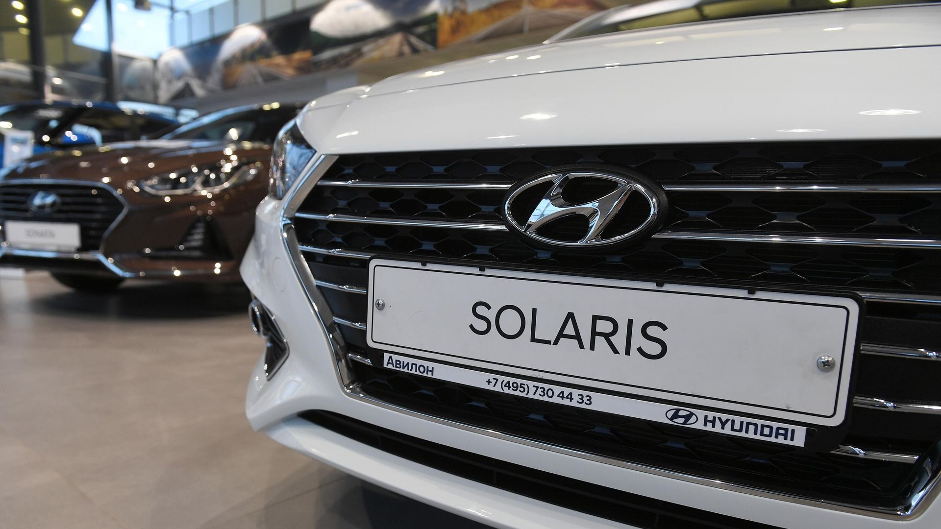 Автомобиль Hyundai Solaris в автосалоне в Москве Автомобиль Hyundai Solaris в автосалоне в Москве - РИА Новости, 1920, 13.06.2024