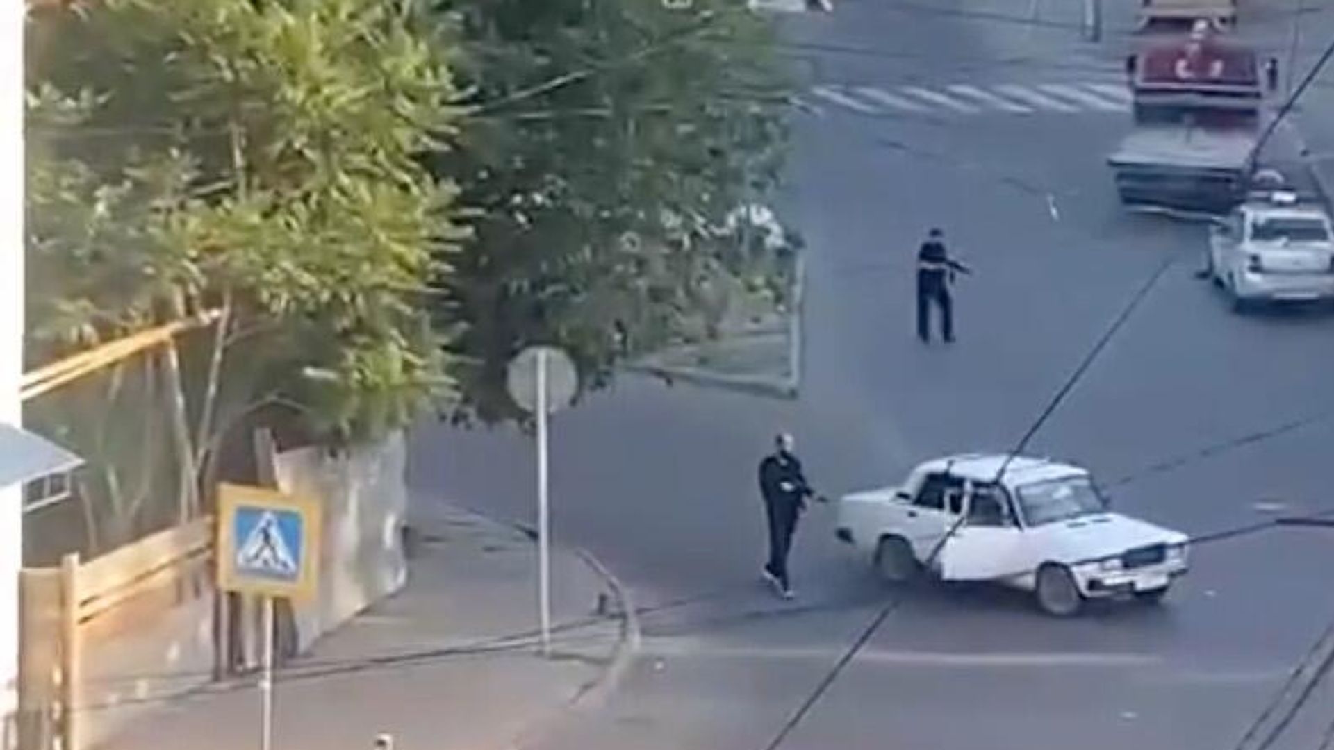 Теракт в Дагестане. Кадр видео очевидца Теракт в Дагестане. Кадр видео очевидца - РИА Новости, 1920, 05.07.2024