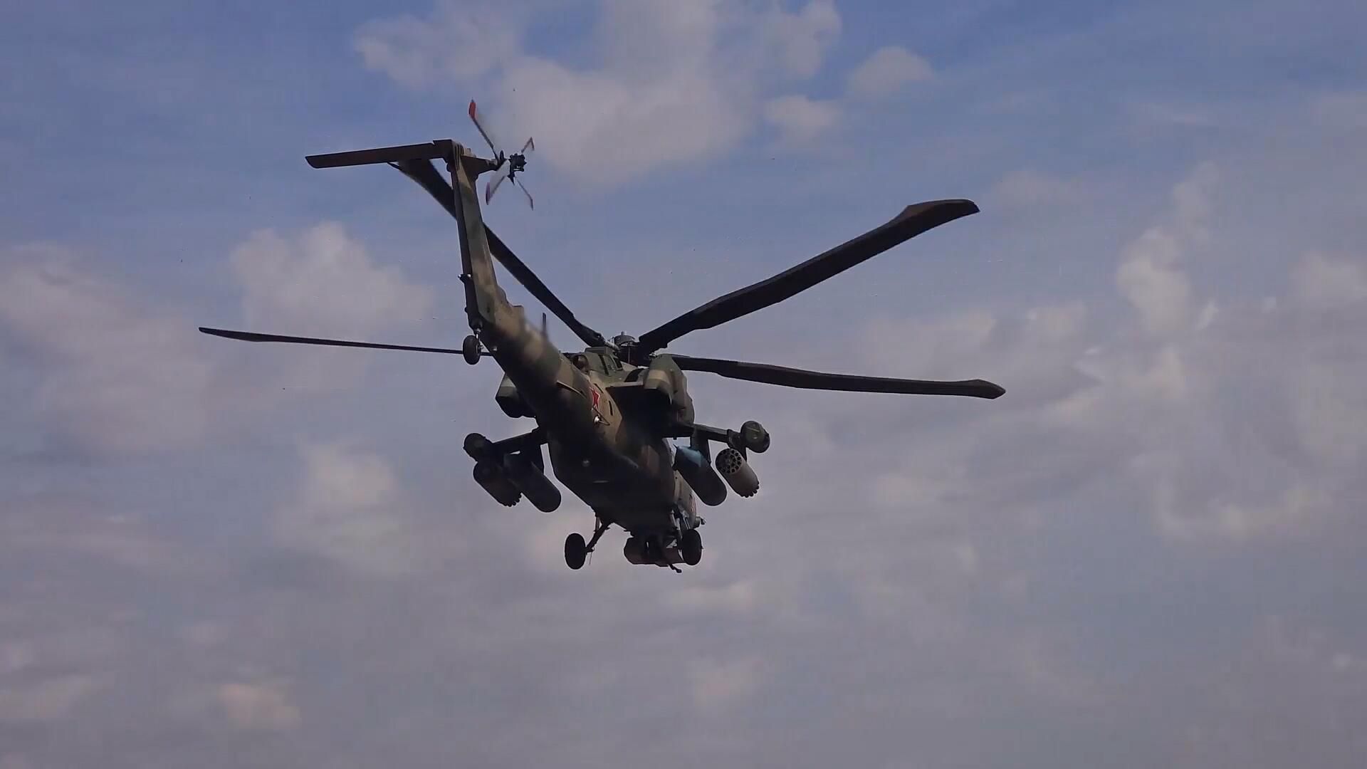 Работа экипажа Ми-28нм в приграничном районе Курской области Работа экипажа Ми-28нм в приграничном районе Курской области - РИА Новости, 1920, 15.09.2024