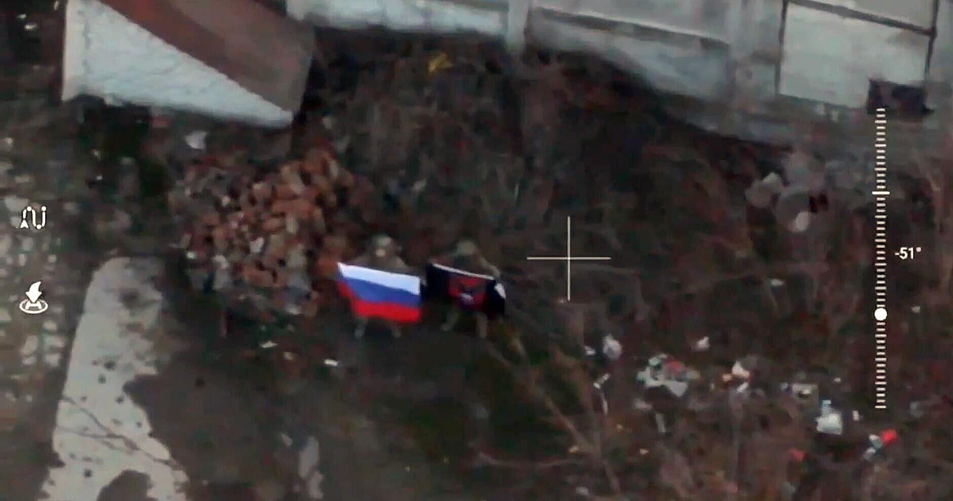 Российские военные с флагом России на западной окраине города Курахово в ДНР. Кадр видео Российские военные с флагом России на западной окраине города Курахово в ДНР. Кадр видео - РИА Новости, 1920, 10.01.2025