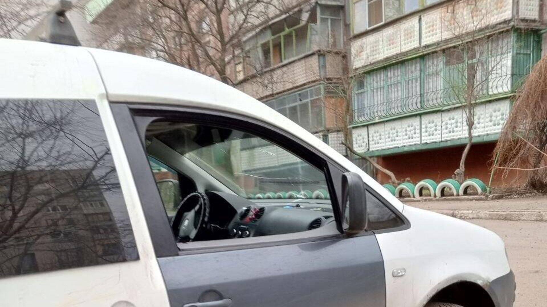 Последствия обстрела жилмассива Строитель в Никитовском районе Горловки. 31 января 2025 - РИА Новости, 1920, 31.01.2025