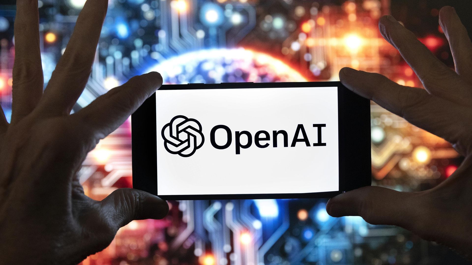 Логотип OpenAI на экране мобильного телефона Логотип OpenAI на экране мобильного телефона - РИА Новости, 1920, 20.01.2026