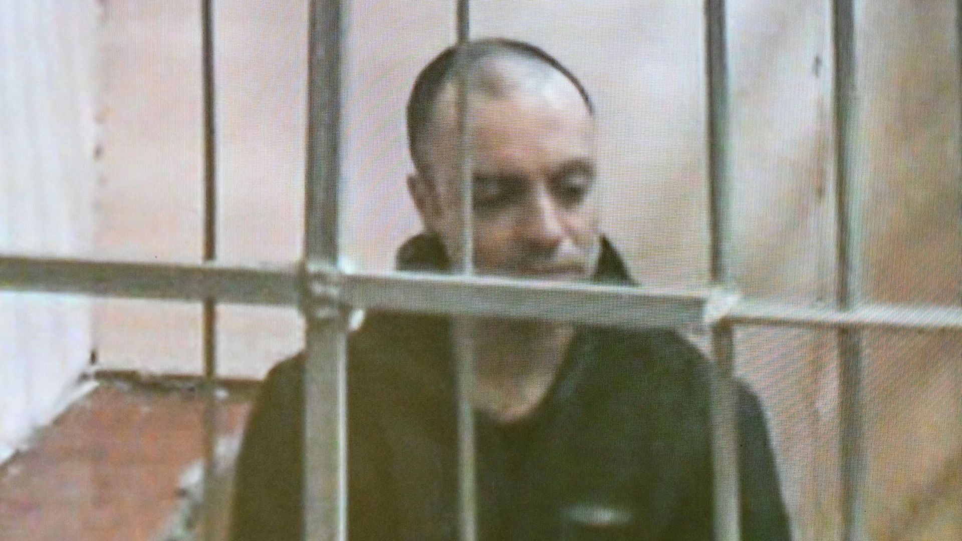 Гражданин России и Италии Руслан Сидики* в режиме видеотрансляции на заседании во Втором Западном окружном военном суде в Москве Гражданин России и Италии Руслан Сидики* в режиме видеотрансляции на заседании во Втором Западном окружном военном суде в Москве - РИА Новости, 1920, 27.08.2025