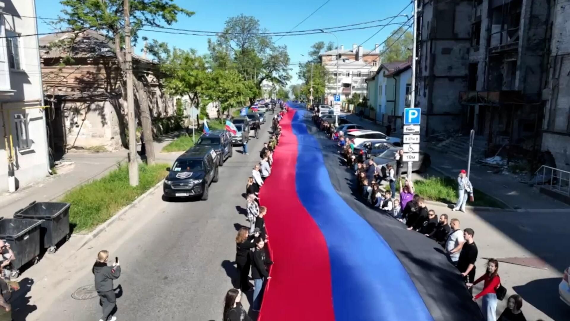 Автопробег и 200-метровый флаг ДНР в преддверии Дня освобождения Мариуполя Автопробег и 200-метровый флаг ДНР в преддверии Дня освобождения Мариуполя - РИА Новости, 1920, 18.05.2025