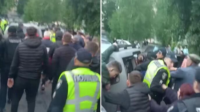 Люди заблокировали автомобиль ТЦК в городе Каменец-Подольский на западе Украины - РИА Новости, 1920, 31.05.2025