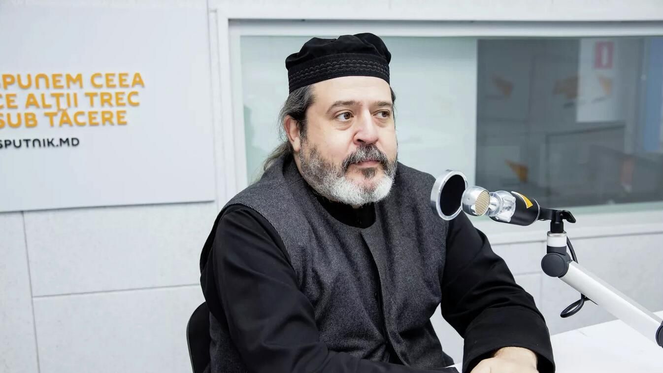 Протоиерей Храма Святого Георгия в Кишиневе Виталий Шинкарь Протоиерей Храма Святого Георгия в Кишиневе Виталий Шинкарь - РИА Новости, 1920, 31.05.2025