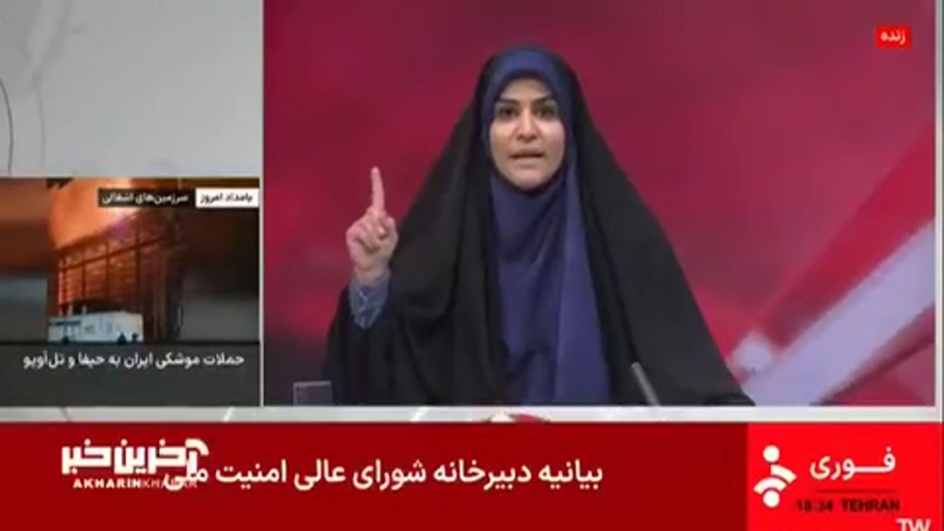 Момент удара Израиля по офису гостелерадиокомпании IRIB во время прямого эфира Момент удара Израиля по офису гостелерадиокомпании IRIB во время прямого эфира - РИА Новости, 1920, 16.06.2025