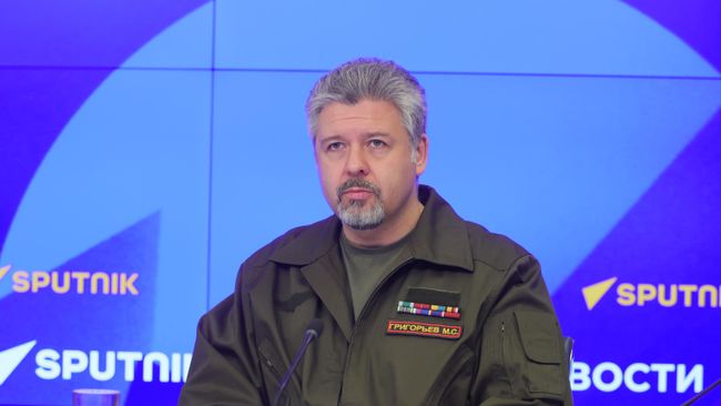 Председатель Международного общественного трибунала по преступлениям украинских неонацистов Максим Григорьев представил доклад Злодеяния и военные преступления киевского режима в городе Дзержинск (Торецк)