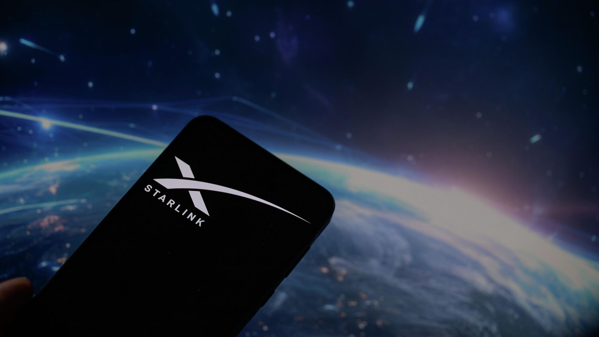 Приложение Starlink на мобильном телефоне - РИА Новости, 1920, 24.07.2025