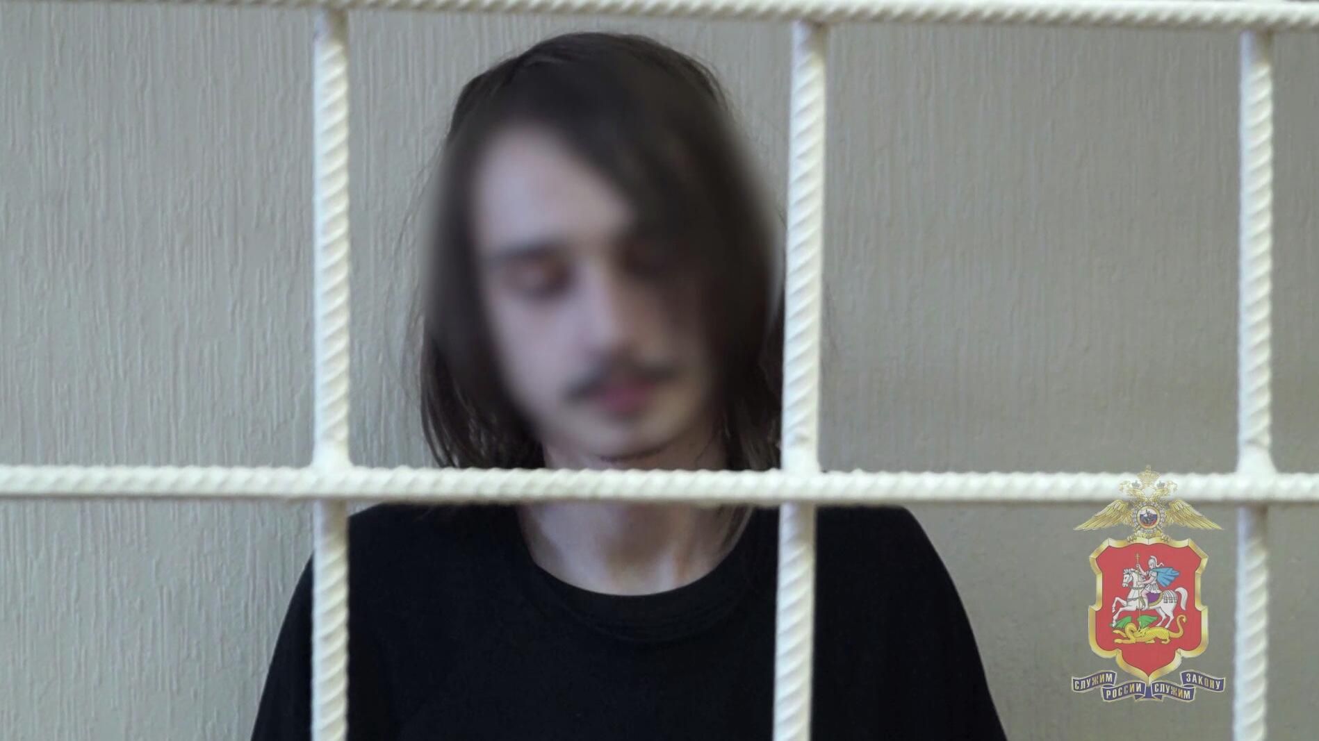 Задержанный за стрельбу из окна дома в Сергиевом Посаде. Кадр видео - РИА Новости, 1920, 06.02.2026