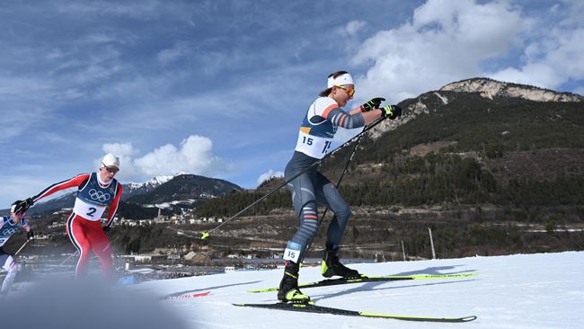 Российский спортсмен Савелий Коростелев на финише соревнований по лыжным гонкам среди мужчин зимних Олимпийских игр 2026 Российский спортсмен Савелий Коростелев на финише соревнований по лыжным гонкам среди мужчин зимних Олимпийских игр 2026