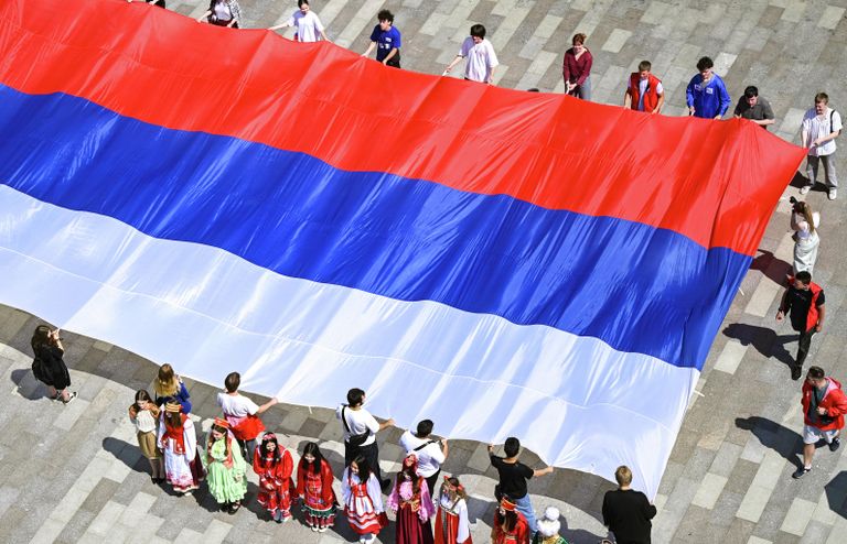 Активисты Молодой Гвардии Единой России и Волонтерской Роты во время патриотической акции в Москве в преддверии Дня России Активисты Молодой Гвардии Единой России и Волонтерской Роты во время патриотической акции в Москве в преддверии Дня России