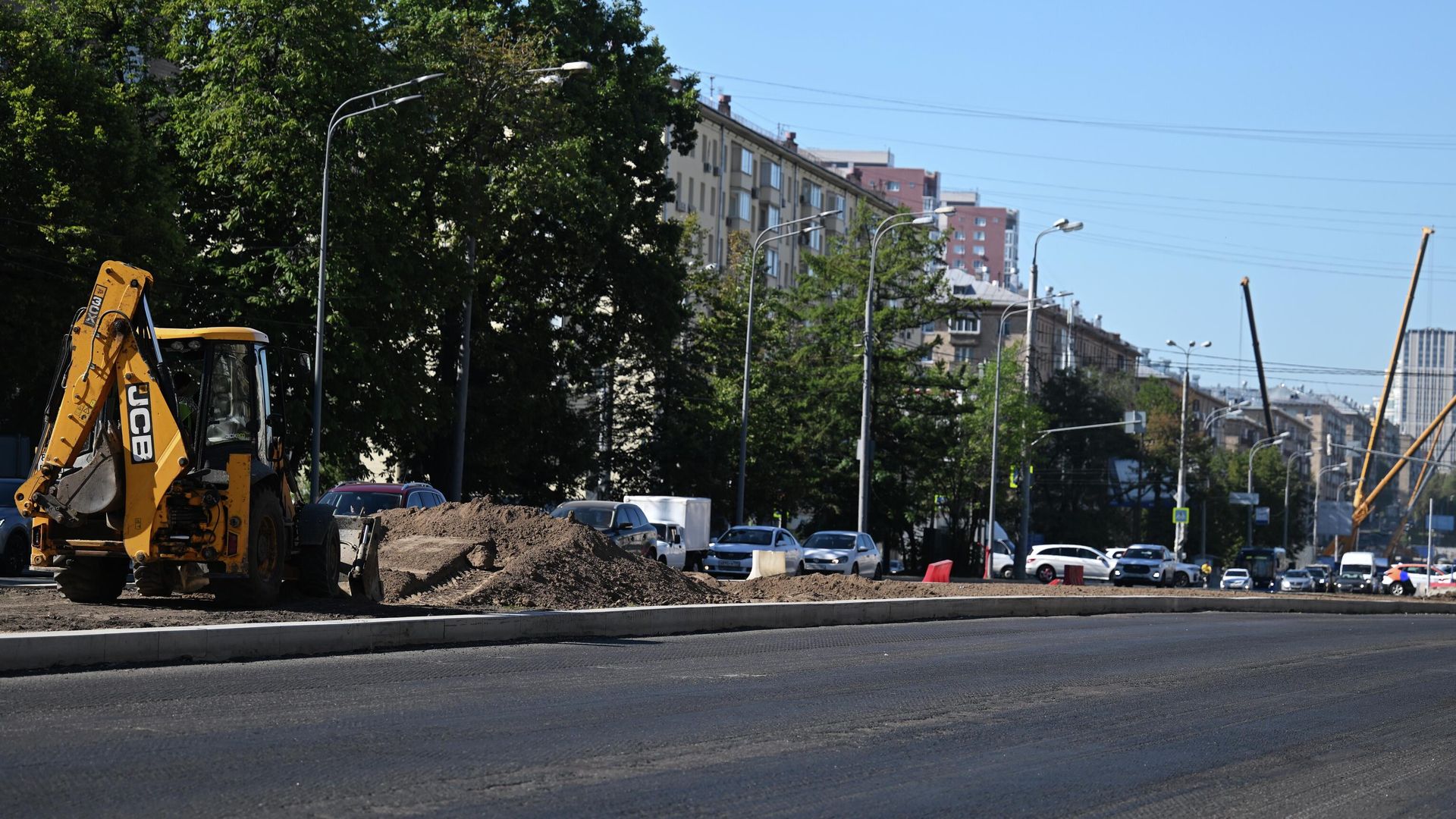 Ремонтные работы на Молодежной улице в Москве. Ремонтные работы на Молодежной улице в Москве. - РИА Новости, 1920, 03.08.2026