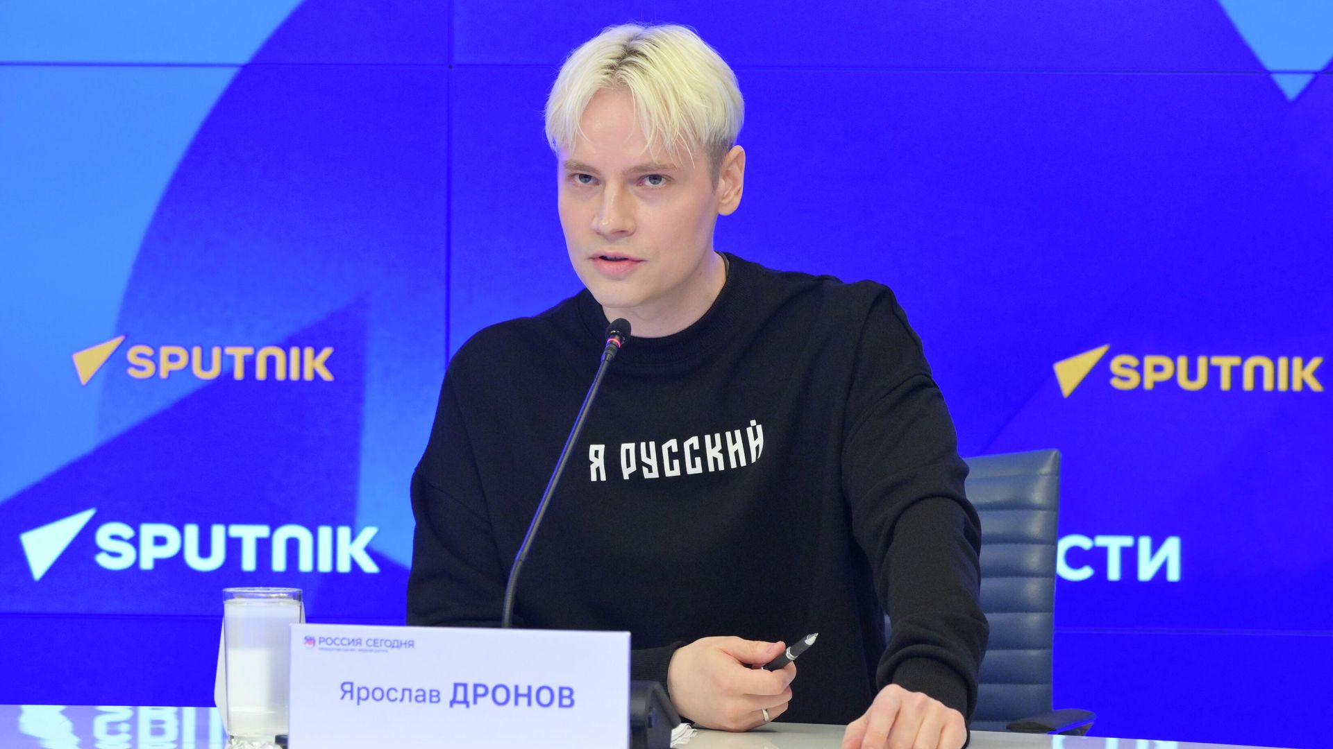 Пресс-конференция заслуженного артиста России Ярослава Дронова (SHAMAN) Пресс-конференция заслуженного артиста России Ярослава Дронова (SHAMAN) - РИА Новости, 1920, 22.07.2026