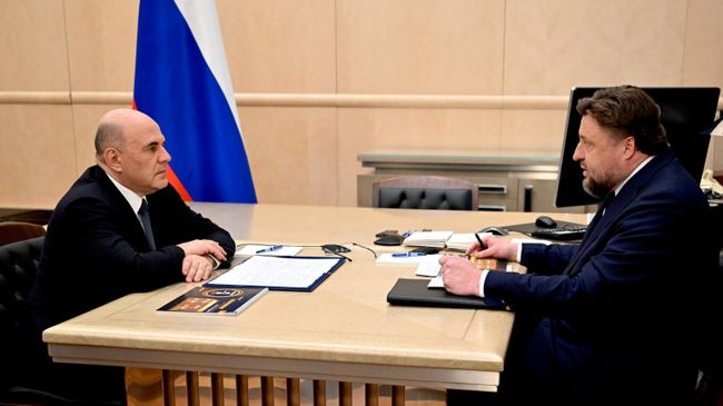 Михаил Мишустин и Павел Косов во время встречи