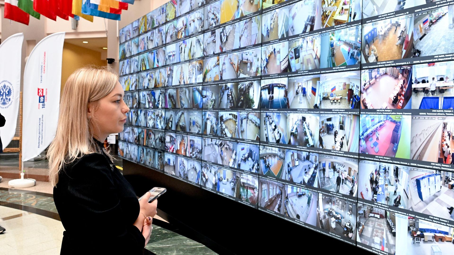 Экраны с участками для голосования в Информационном центре Центральной избирательной комиссии РФ во время выборов депутатов Государственной Думы РФ девятого созыва Экраны с участками для голосования в Информационном центре Центральной избирательной комиссии РФ во время выборов депутатов Государственной Думы РФ девятого созыва - РИА Новости, 1920, 18.09.2026