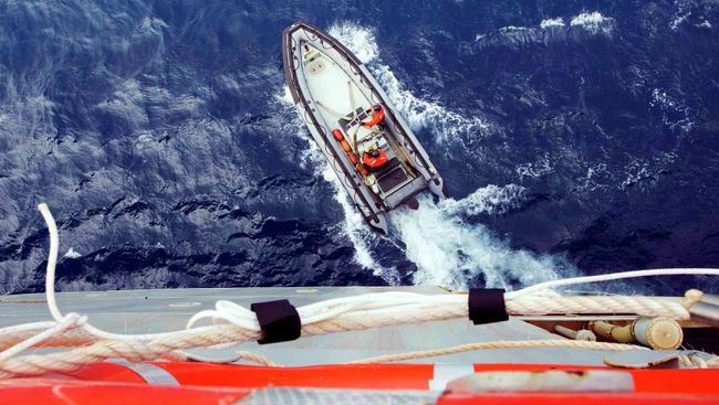 Поиск пропавшего самолета Malaysian Airlines рейс MH370 в Индийском океане. Архивное фото Поиск пропавшего самолета Malaysian Airlines рейс MH370 в Индийском океане. Архивное фото