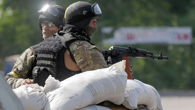 Украинские силовики на блокпосту. Архивное фото Украинские силовики на блокпосту. Архивное фото