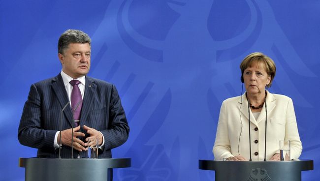Канцлер ФРГ Ангела Меркель и президент Украины Петр Порошенко. Архивное фото Канцлер ФРГ Ангела Меркель и президент Украины Петр Порошенко. Архивное фото