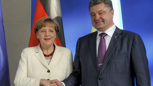 Ангела Меркель и Петр Порошенко. Архивное фото Ангела Меркель и Петр Порошенко. Архивное фото